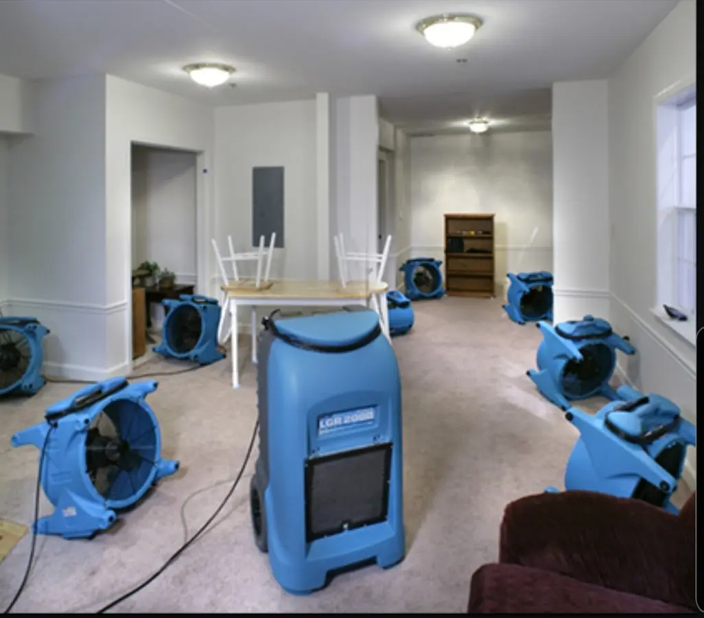Air movers and dehumidifier setup for Water Damage Restoration in Roselle